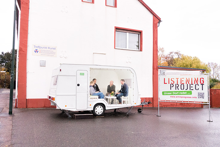 our village talks ... in the rain
